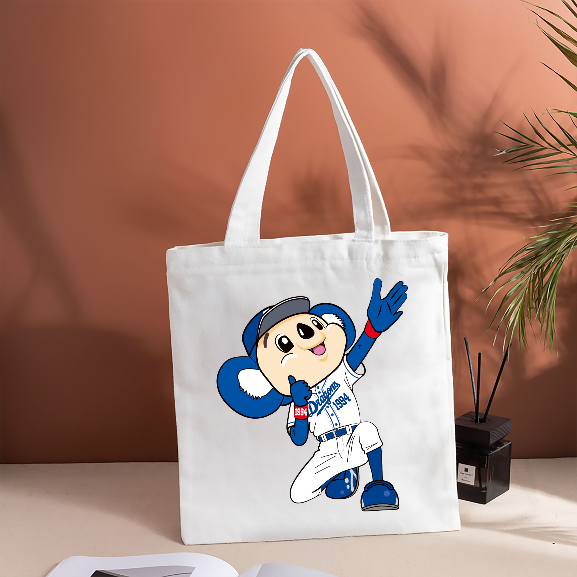 CHUNICHI DRAGONS MASCOT DOALA APPLICATION SHOUT WELCOME Logo