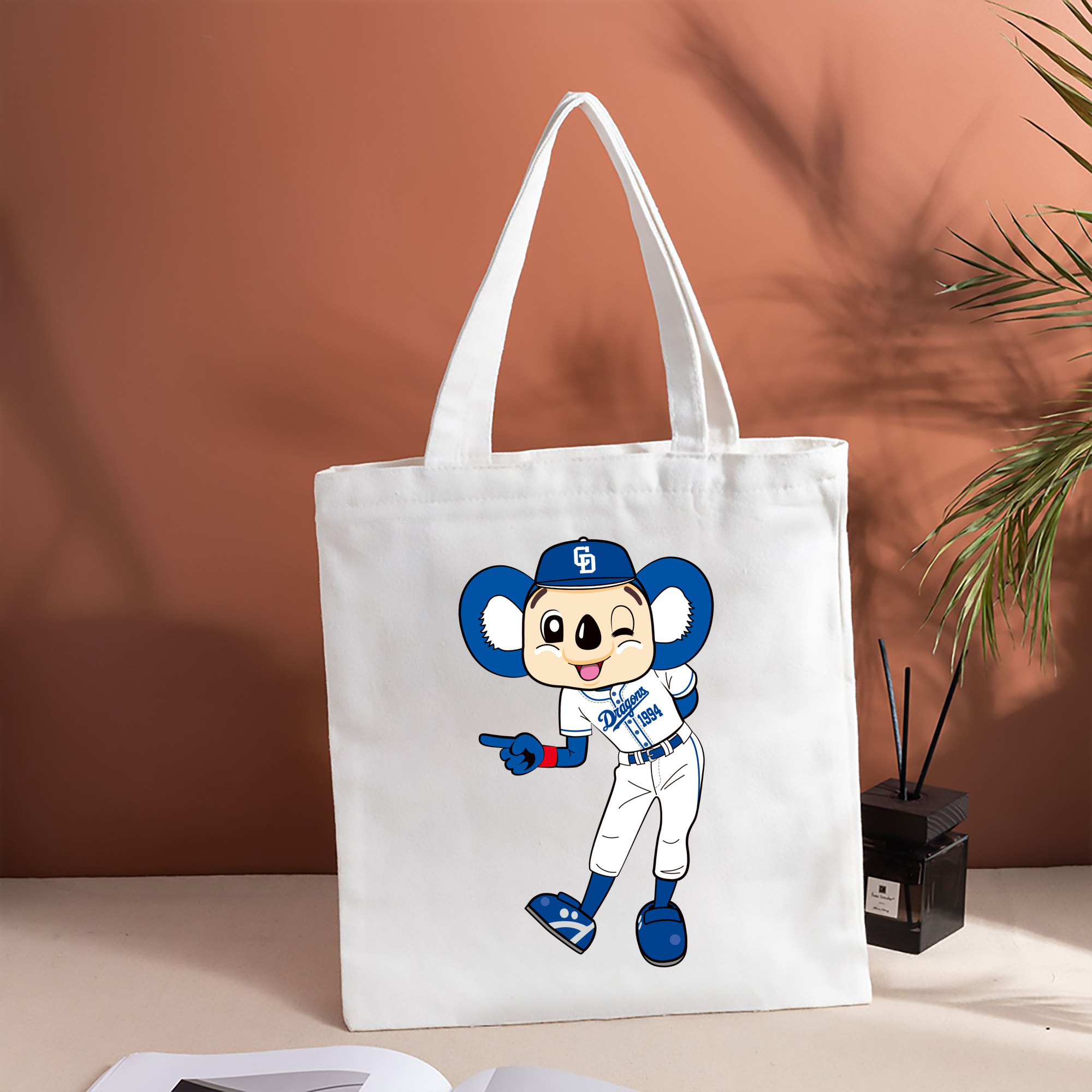 CHUNICHI DRAGONS MASCOT DOALA APPLICATION WINK INDICIATION Logo